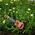 Mini Wooden Finish Plastic Guitar Music Instrument With 4 Strings C...